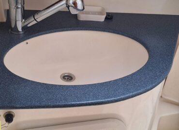 The bathroom with hot-water shower