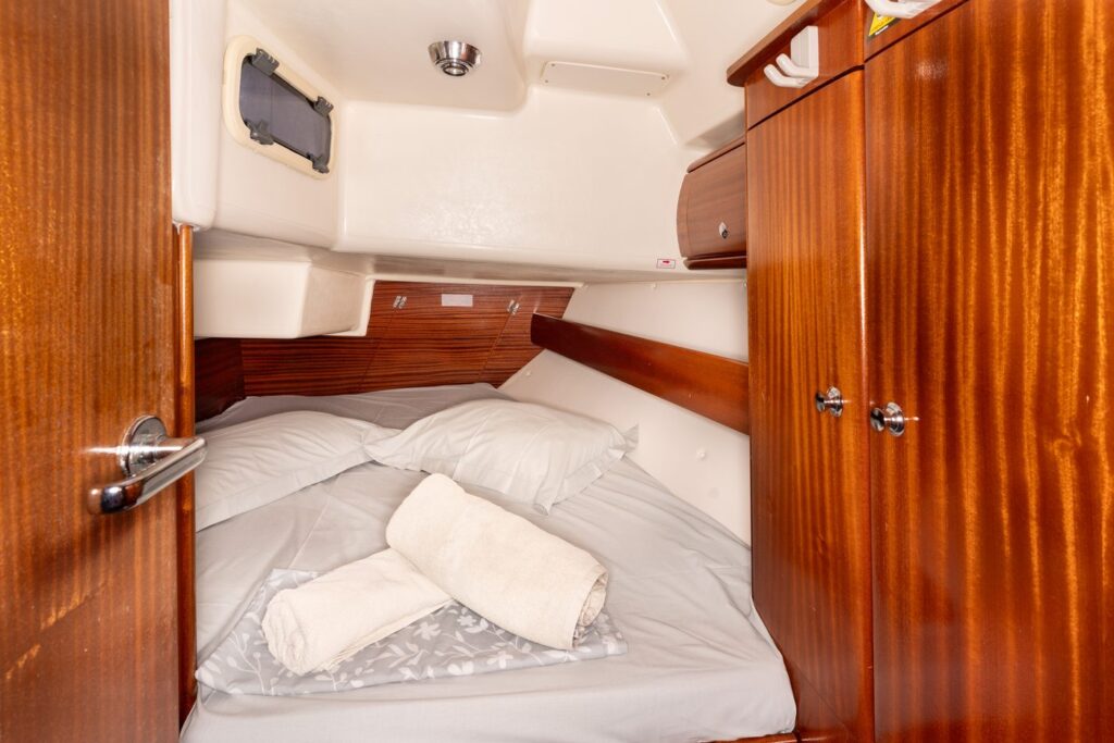 The forward cabin of Yacht Pipit with its extra-large double berth