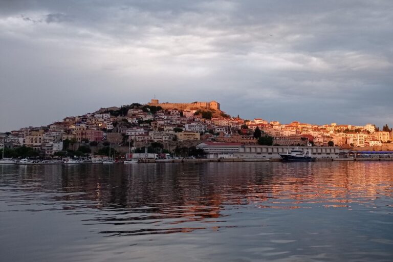 The old town of Kavala at golden hour, from the sea